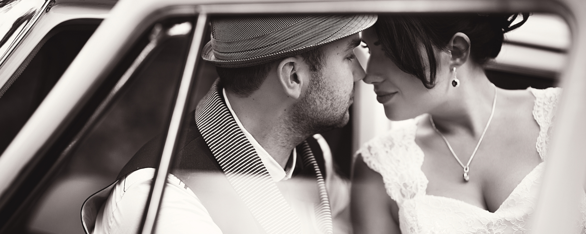 bride and groom inside limo