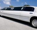 A beautiful white stretch limousine.