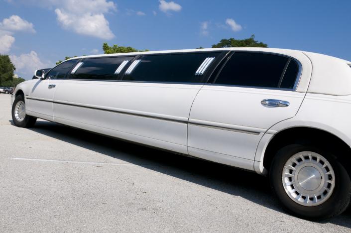 A beautiful white stretch limousine.